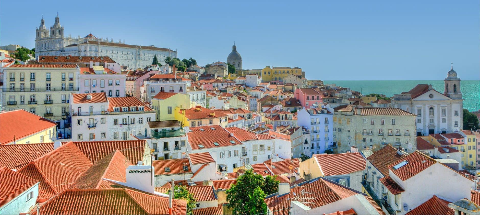 Portuguese NHR: Non-Habitual Residency vs Simplified Tax Regime 5 city lisbon houses portugal